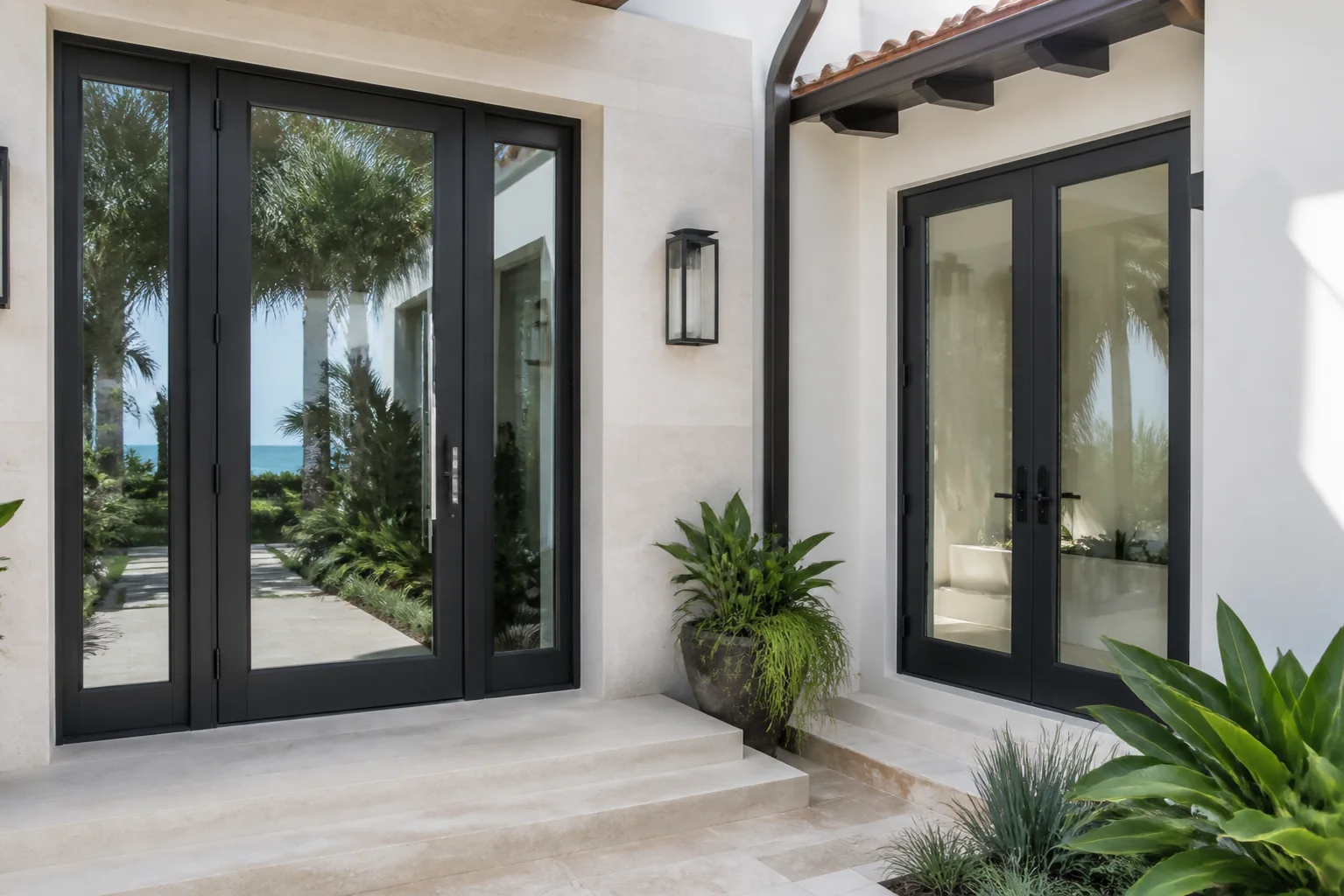 Impact-rated entry and French doors on a coastal home